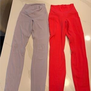 Purple and pink pair of high-Waisted lululemon Leggings size 2 and 0
